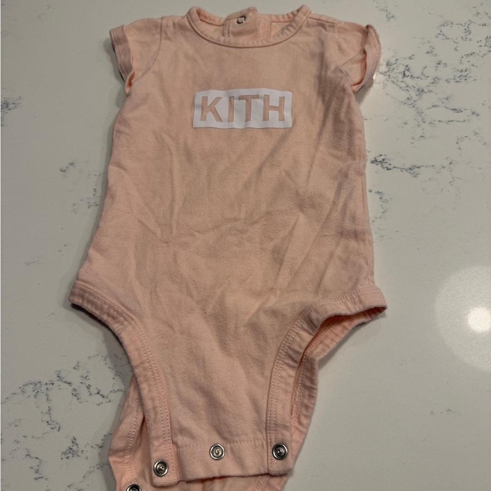 Kith Peach Baby Onesie